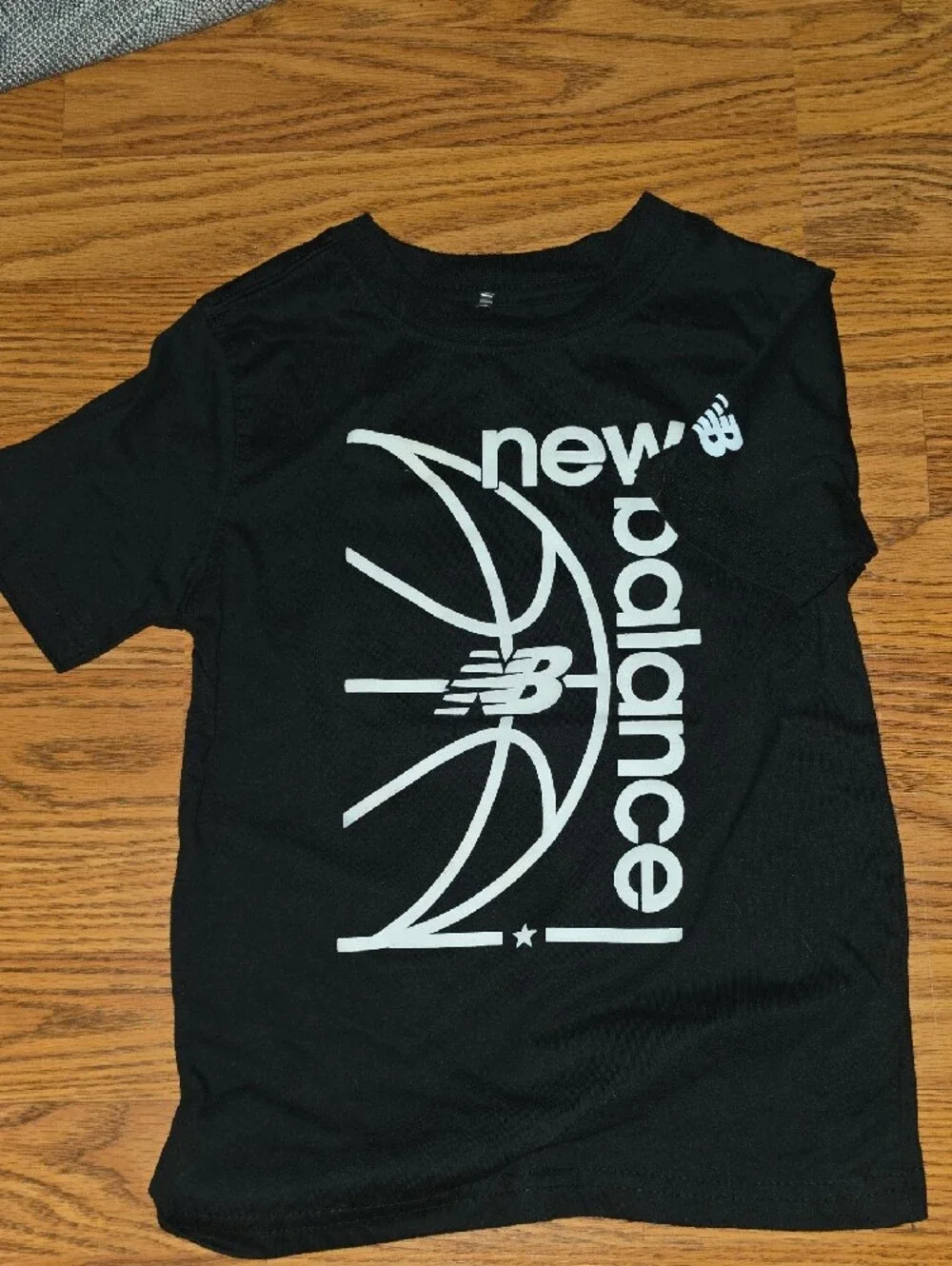 New Balance Black Tee with White Basketball Graphic